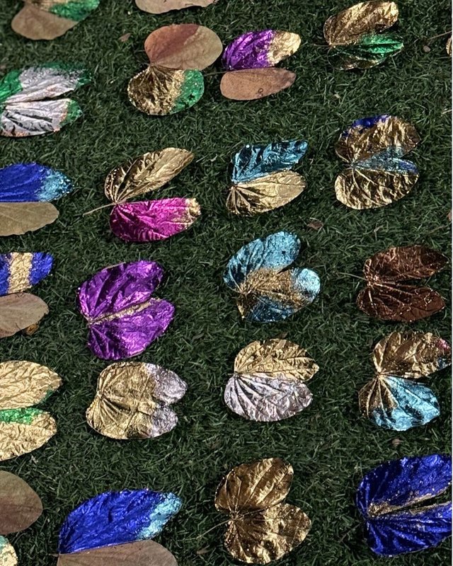 Collection of reflective colored leaves.